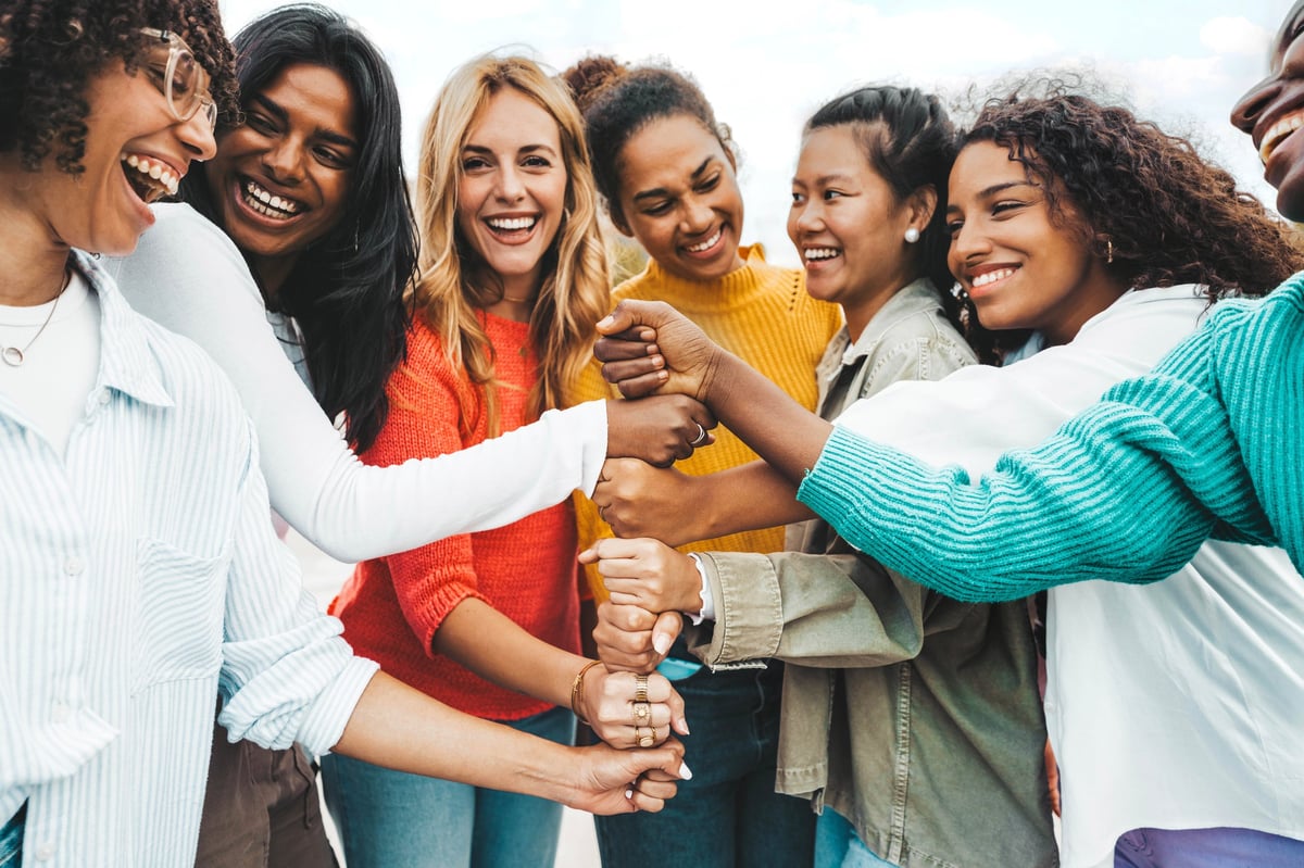 A multicultural community of women gathering in support and strength